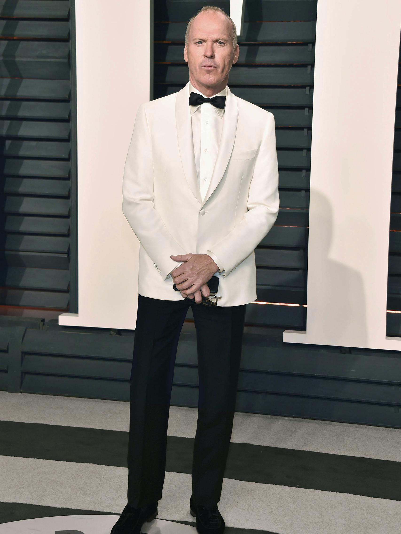 Michael Keaton wearing a Brioni bespoke tuxedo