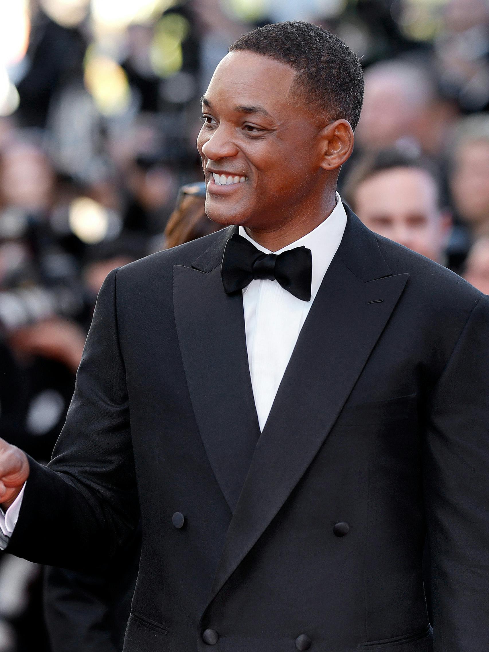 Will Smith wearing a Brioni bespoke black tuxedo