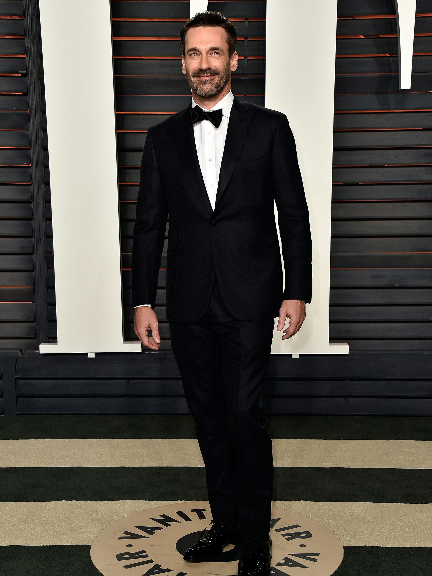 Jon Hamm wearing a Brioni bespoke black tuxedo