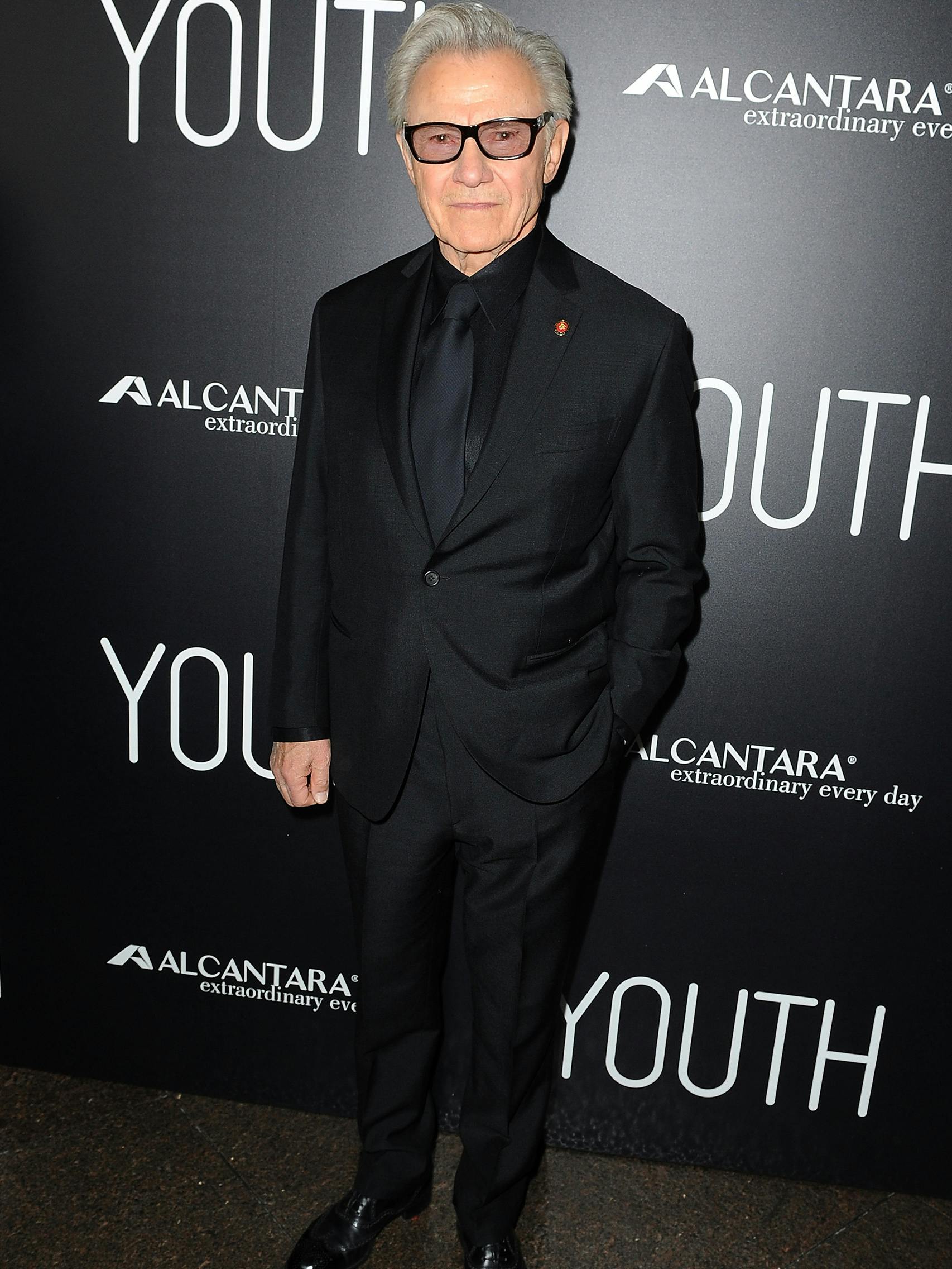 Harvey Keitel wearing a Brioni bespoke black suit